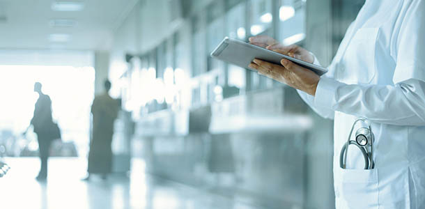 find a sleep center - doctor looking at tablet