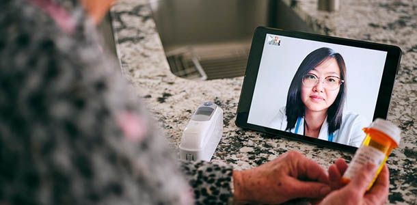 telemedicine - doctor on tablet
