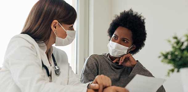 patient_talking_to_doctor patients - doctor and patient going over results