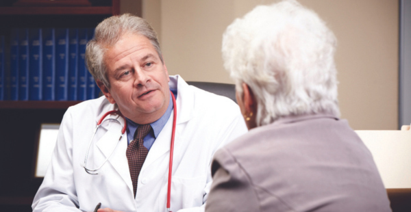 woman using calculator